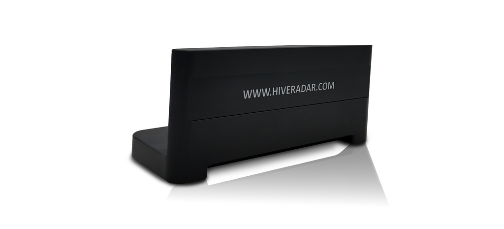 A black plastic slot cover on an angle displaying the white text 'WWW.HIVERADAR.COM'